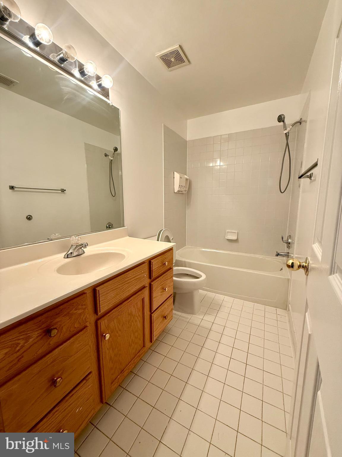 12447 Red Patch Lane Fairfax, VA 22033 - Photo 26 of 34 a bathroom with a sink a toilet and shower
