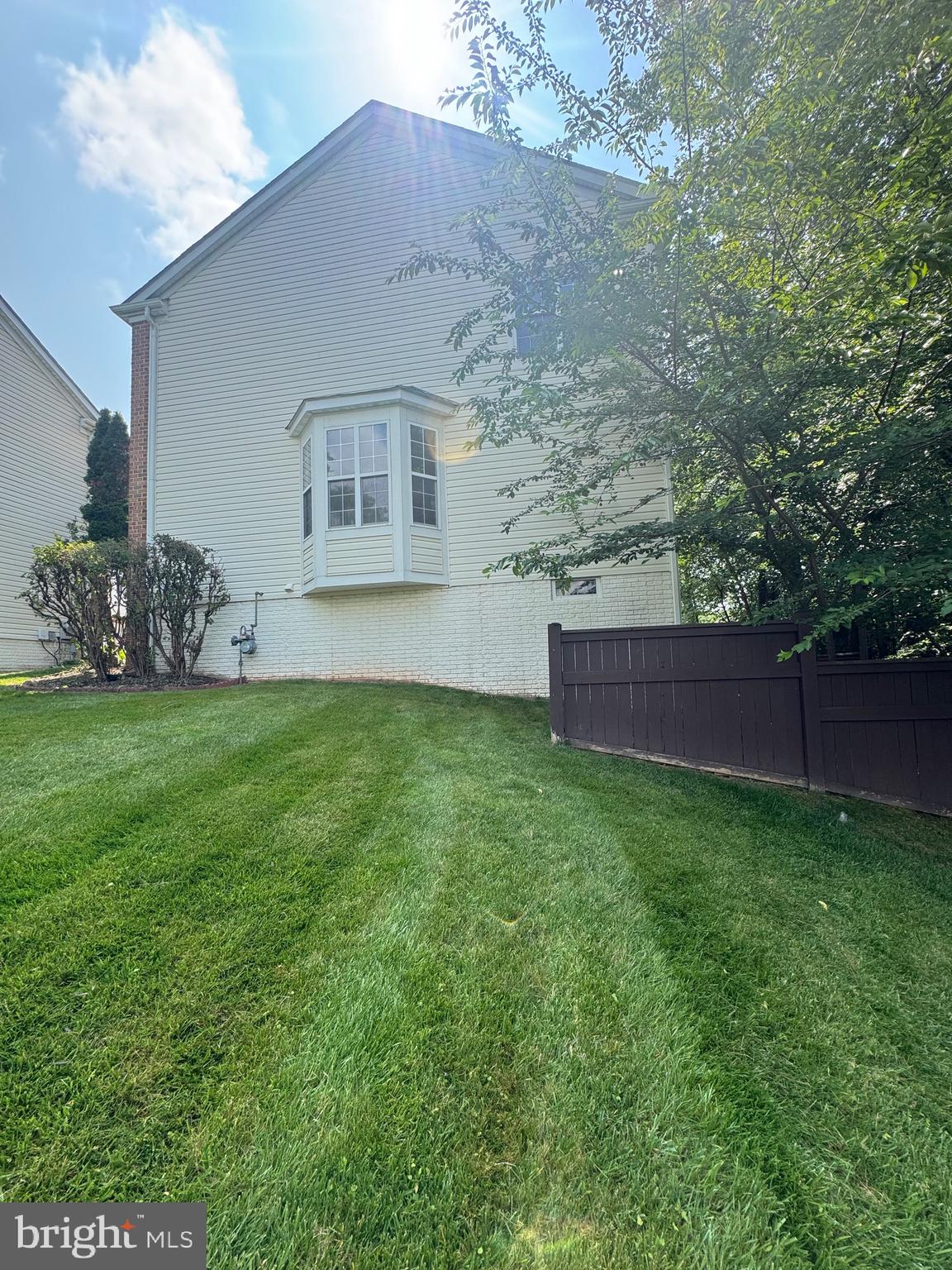 12447 Red Patch Lane Fairfax, VA 22033 - Photo 34 of 34 a front view of a house with garden