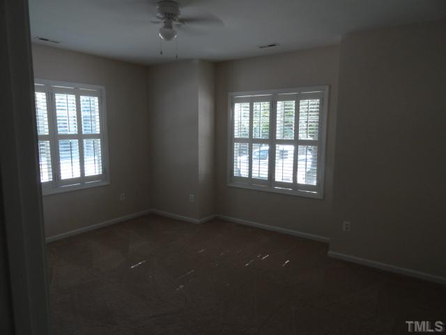 2911 Andover Glen Road Raleigh, NC 27604 - Photo 8 of 10 a view of an empty room with a window