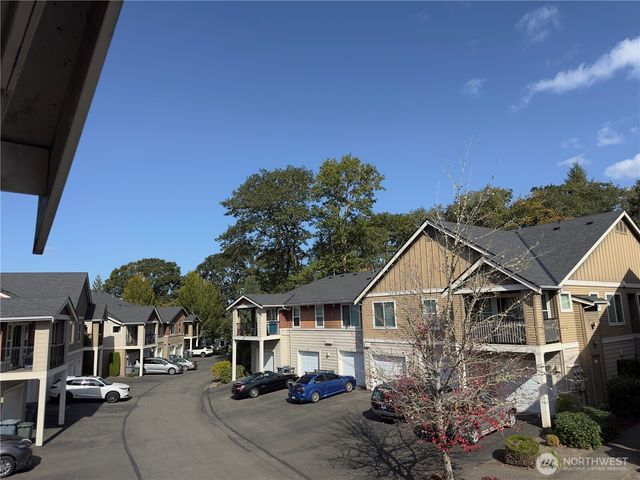a view of a house with a street