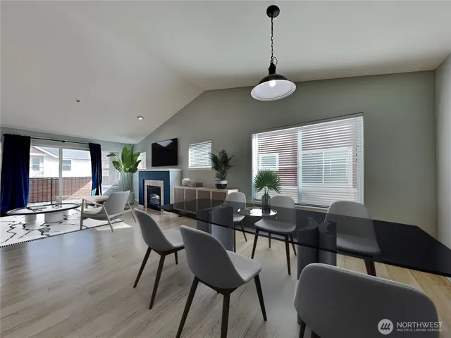 a view of a dining room with furniture window and outside view