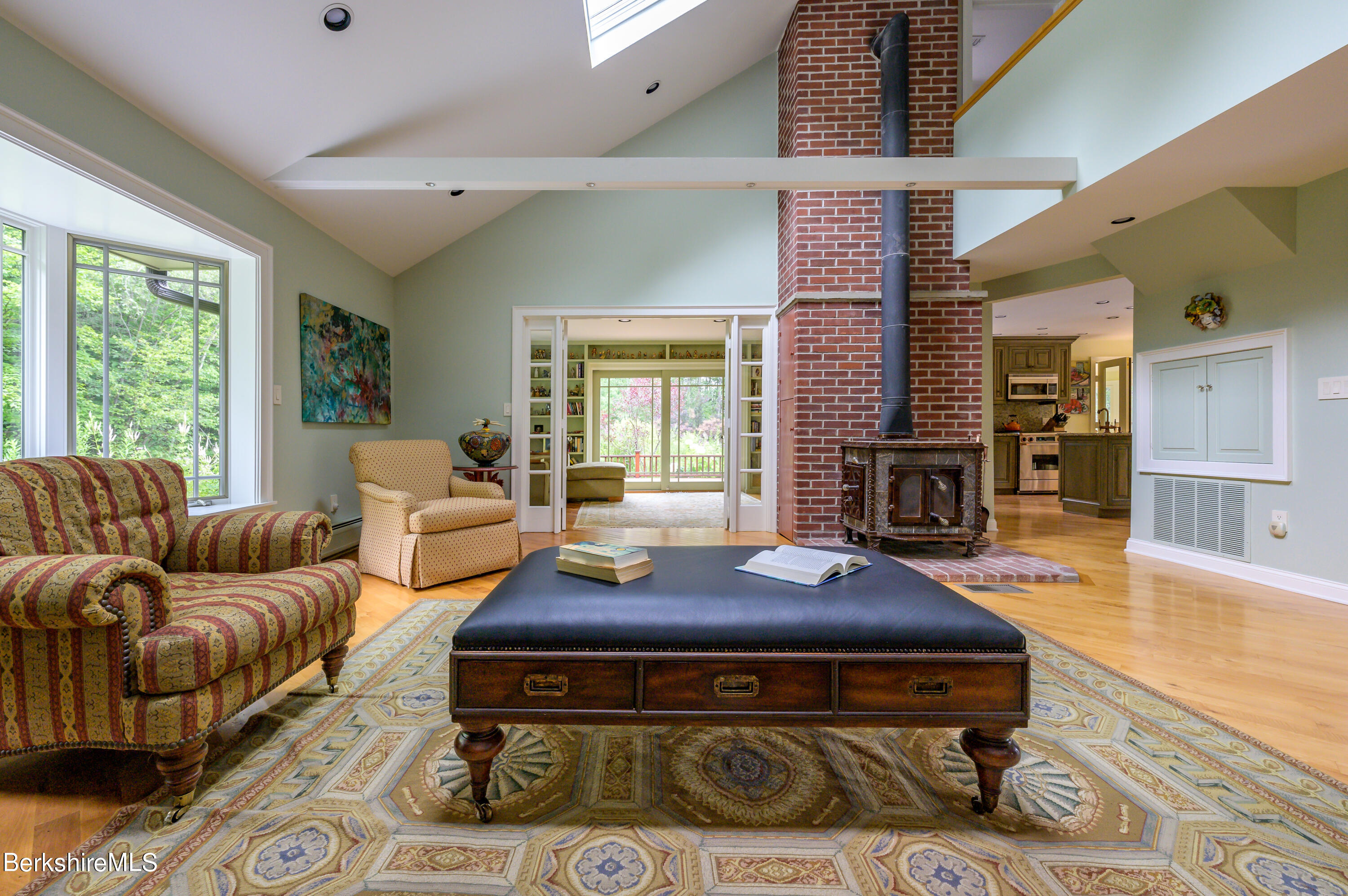 66 West Center Road West Stockbridge, MA 01266 - Photo 10 of 47 Living room to den to deck