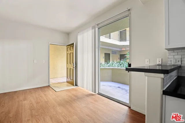 a view of a bathroom from a hallway