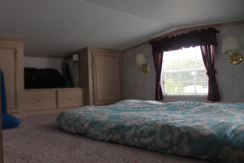 54 Bypass Road, Unit 7 Wells, ME 04090 - Photo 9 of 20 One of two lofts for guests.