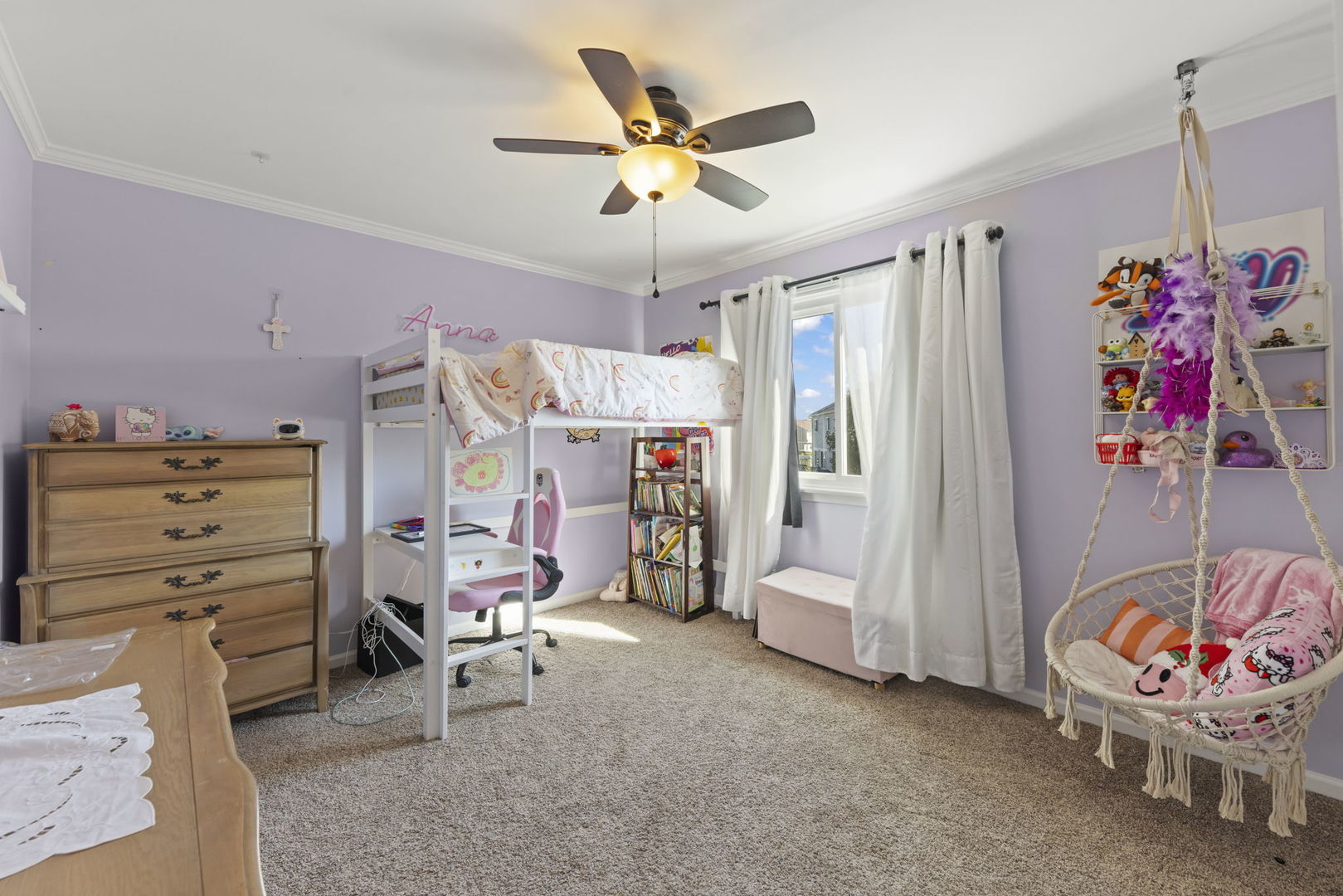 2723 Rosehall Lane Aurora, IL 60503 - Photo 17 of 23 a living room with furniture and a flat screen tv