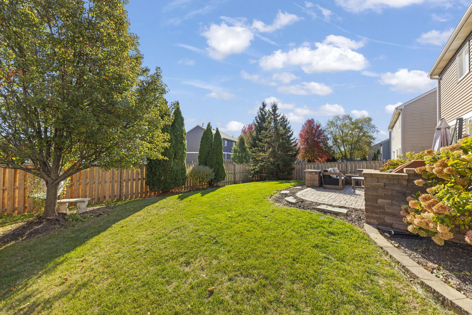 2723 Rosehall Lane Aurora, IL 60503 - Photo 21 of 23 a view of a backyard with sitting area