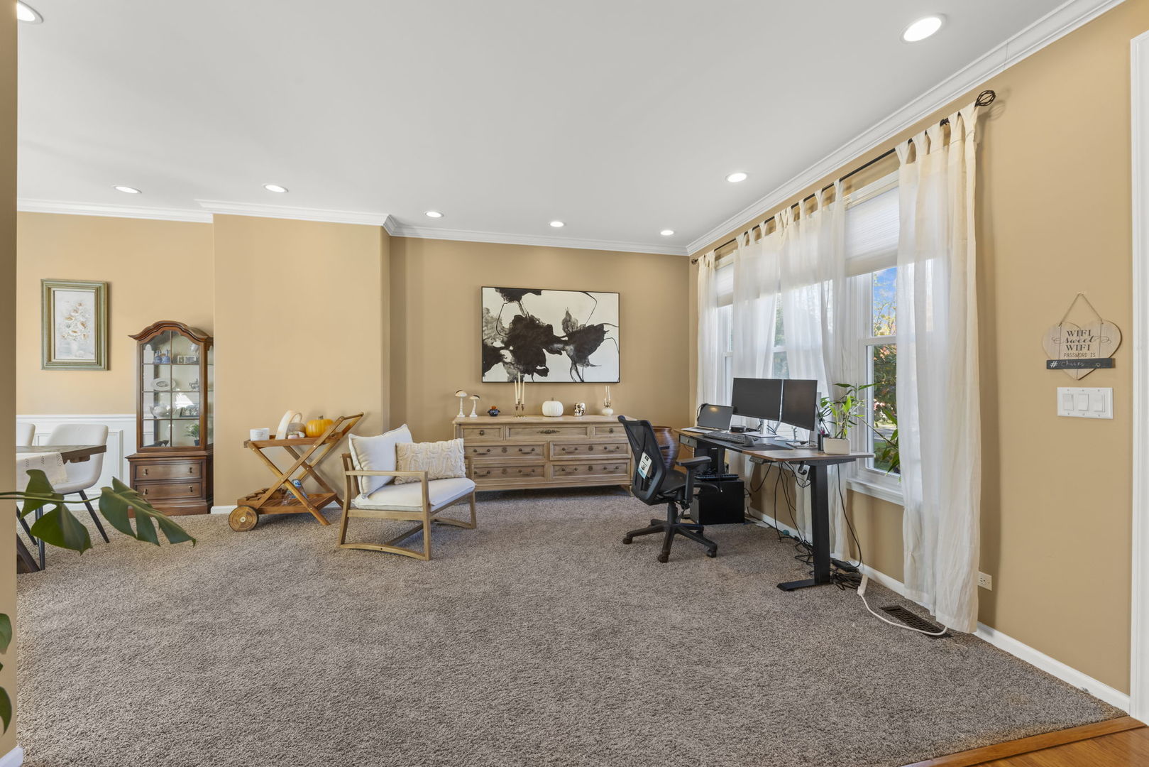 2723 Rosehall Lane Aurora, IL 60503 - Photo 4 of 23 a view of a livingroom with workspace and a window