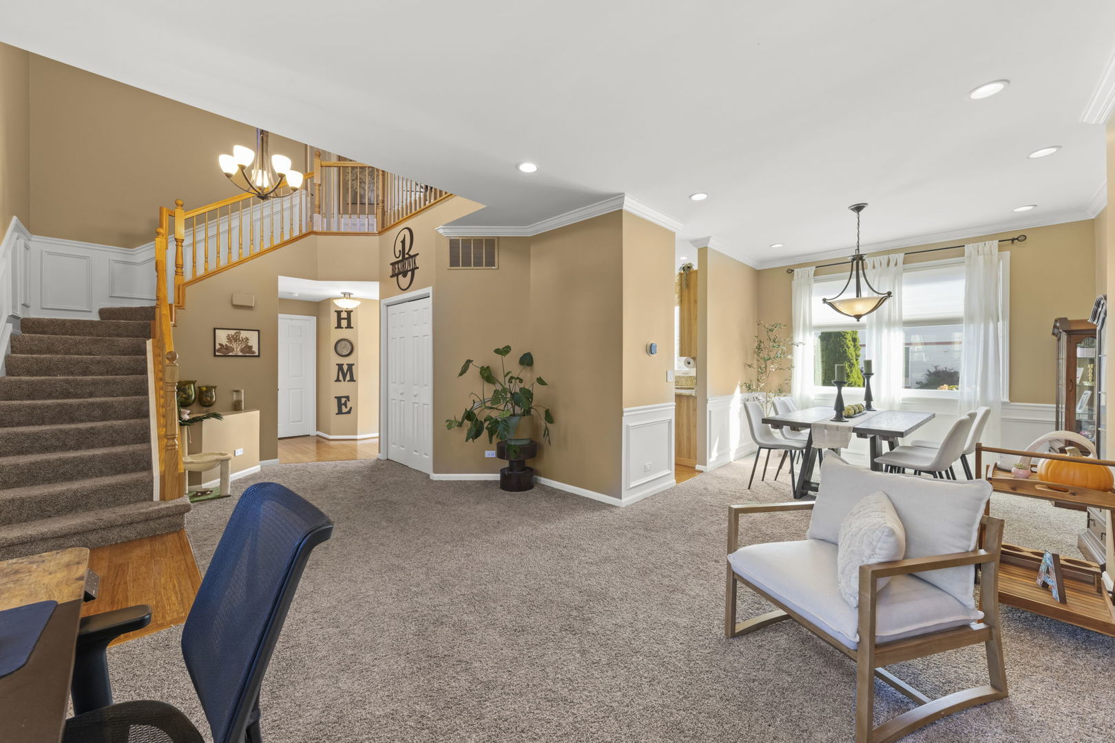 2723 Rosehall Lane Aurora, IL 60503 - Photo 5 of 23 a view of a livingroom with furniture and a large window
