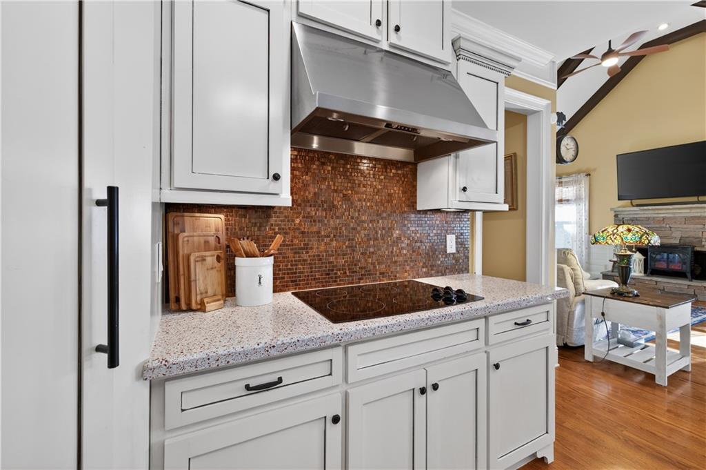 905 Old Forge Lane Jefferson, GA 30549 - Photo 18 of 69 a kitchen with granite countertop a sink and cabinets