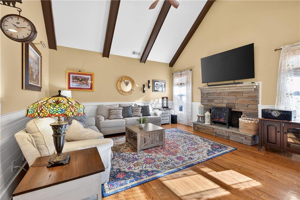 905 Old Forge Lane Jefferson, GA 30549 - Photo 21 of 69 a living room with furniture fireplace and flat screen tv