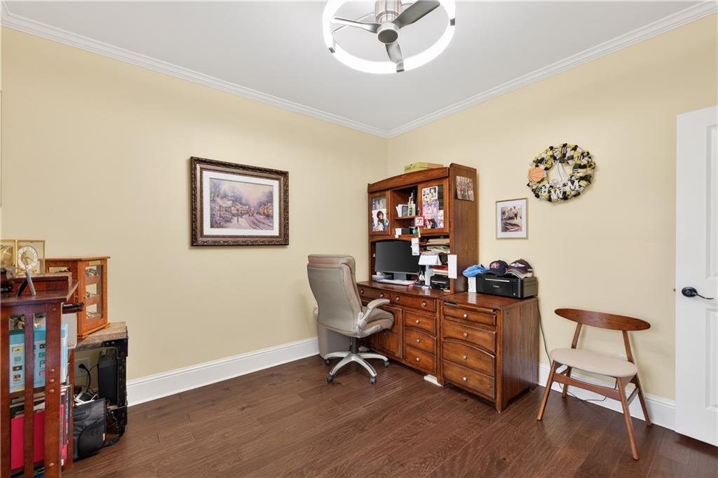 905 Old Forge Lane Jefferson, GA 30549 - Photo 25 of 69 a view of a workspace with furniture and a ceiling fan