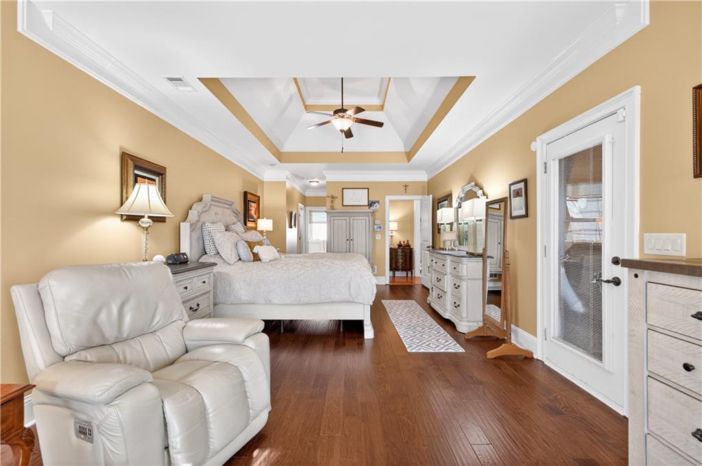 905 Old Forge Lane Jefferson, GA 30549 - Photo 34 of 69 a living room with furniture and a chandelier