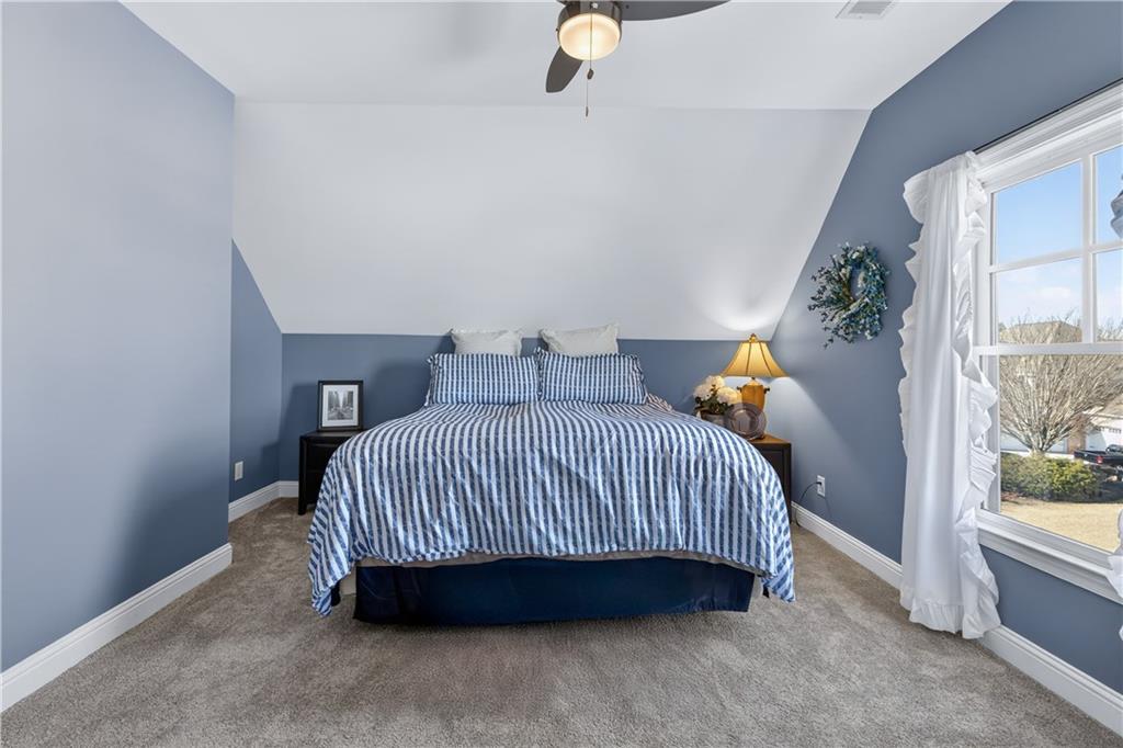 905 Old Forge Lane Jefferson, GA 30549 - Photo 40 of 69 a bedroom with a bed and window
