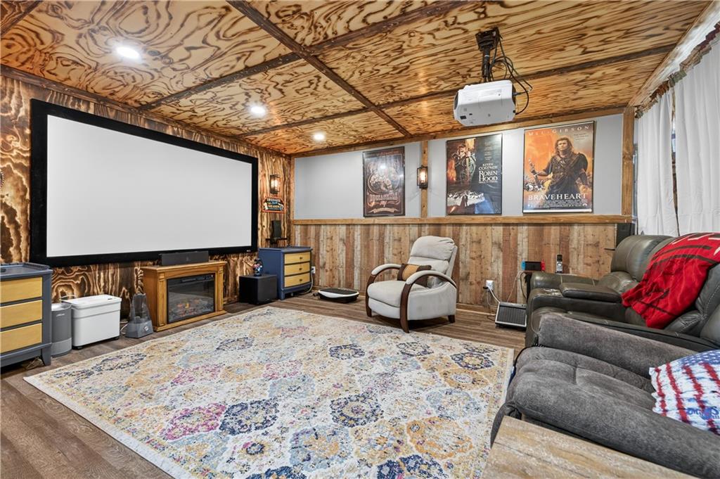 905 Old Forge Lane Jefferson, GA 30549 - Photo 45 of 69 a living room with furniture and a flat screen tv