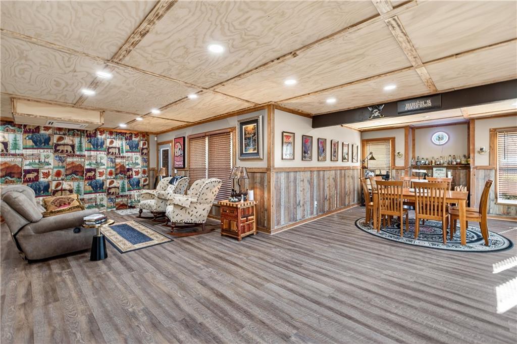 905 Old Forge Lane Jefferson, GA 30549 - Photo 48 of 69 a living room with furniture and a wooden floor