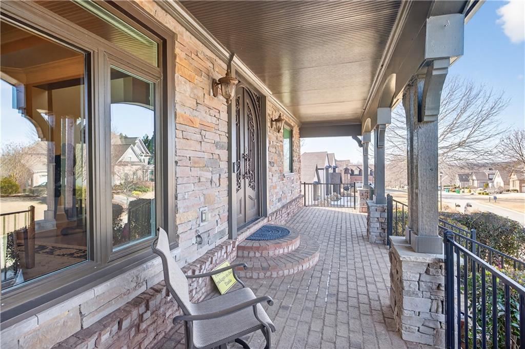 905 Old Forge Lane Jefferson, GA 30549 - Photo 5 of 69 a living room with furniture and a floor to ceiling window