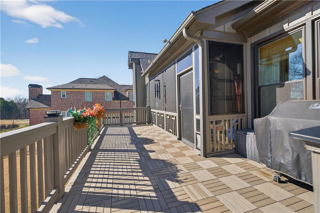 905 Old Forge Lane Jefferson, GA 30549 - Photo 56 of 69 a view of a brick house with a large window and wooden floor
