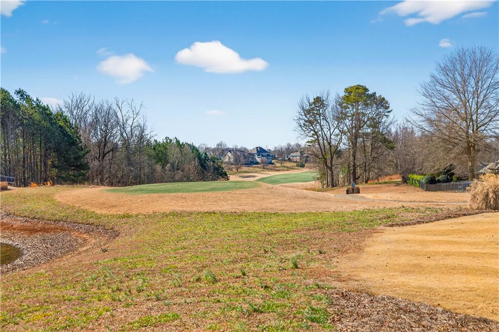 905 Old Forge Lane Jefferson, GA 30549 - Photo 61 of 69 a view of yard with swimming pool and green space