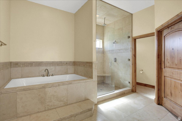 667 Hardscrabble Road Morgan, UT 84050 - Photo 26 of 51 Master Bathroom featuring a bath, a shower stall, and light tile patterned floors