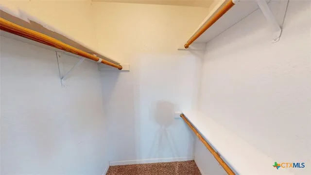 a view of balcony with wooden floor