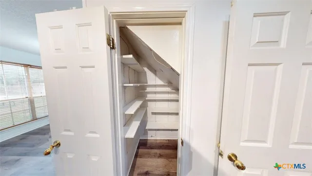 a bathroom with a sink and a large mirror