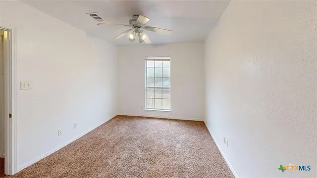 a view of hallway with stairs
