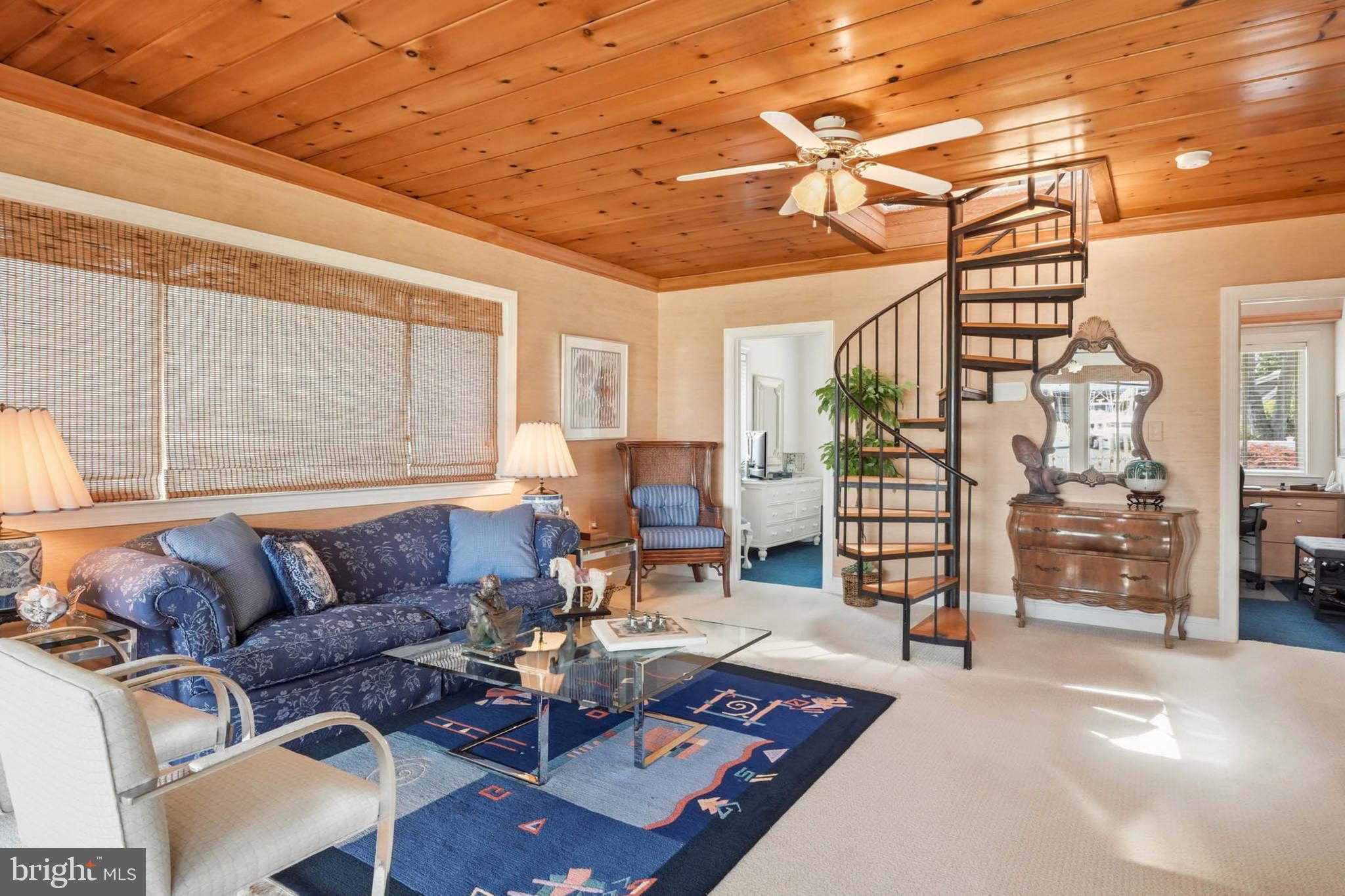 3689 1st Avenue Edgewater, MD 21037 - Photo 36 of 55 Family room w/ spiral staircase to upper level