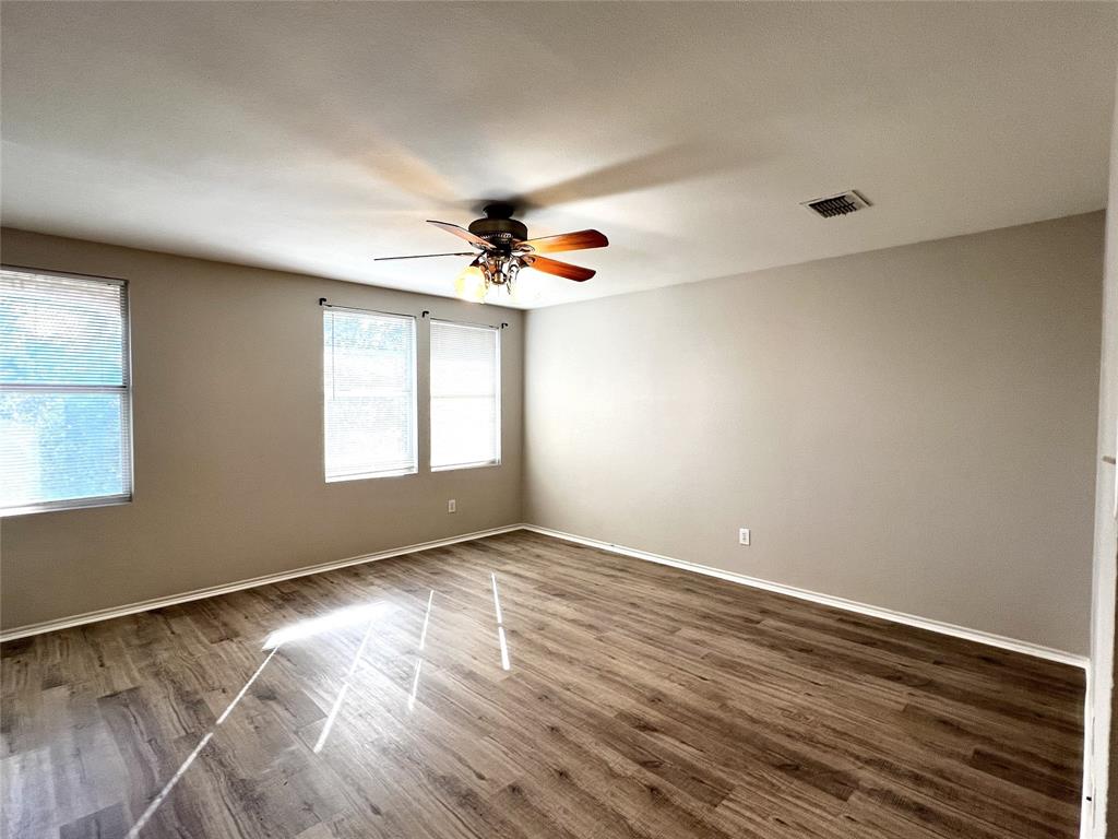 12864 Cowper Drive Frisco, TX 75035 - Photo 23 of 28 a view of an empty room with a window