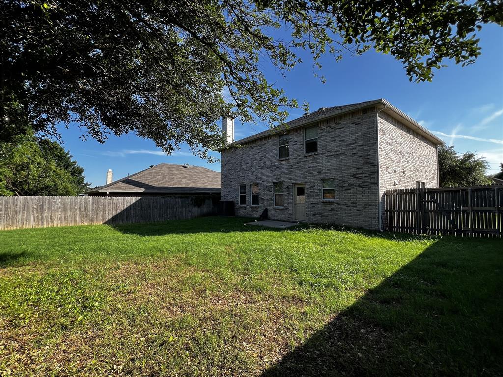 12864 Cowper Drive Frisco, TX 75035 - Photo 28 of 28 a view of a back yard of the house