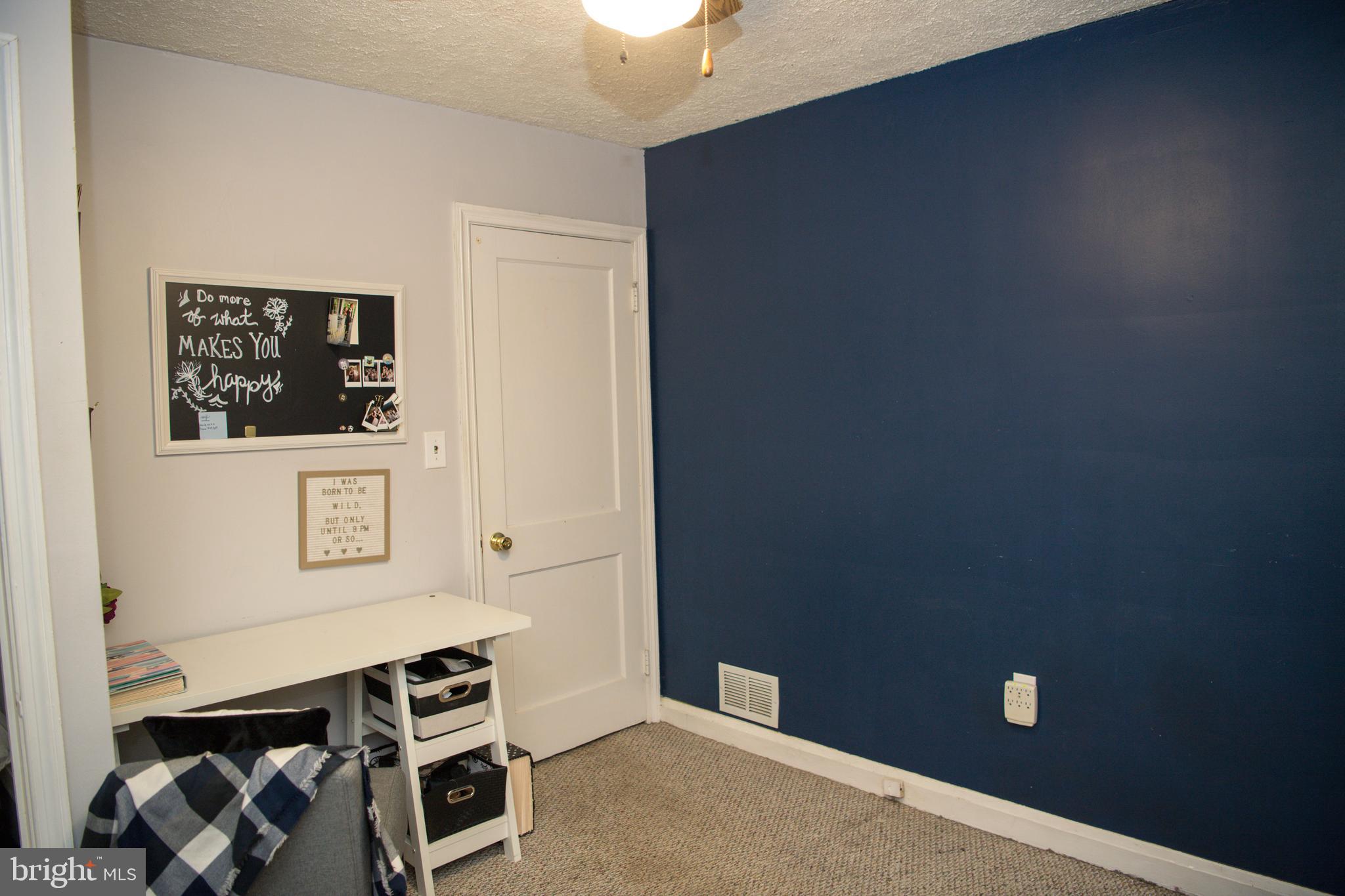 8637 Oak Road Baltimore, MD 21234 - Photo 12 of 18 a view of an entryway with wooden floor