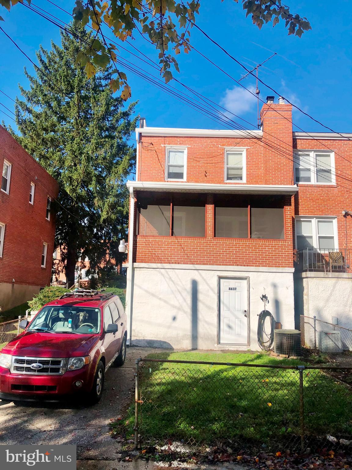 8637 Oak Road Baltimore, MD 21234 - Photo 18 of 18 a front view of a house with a garden