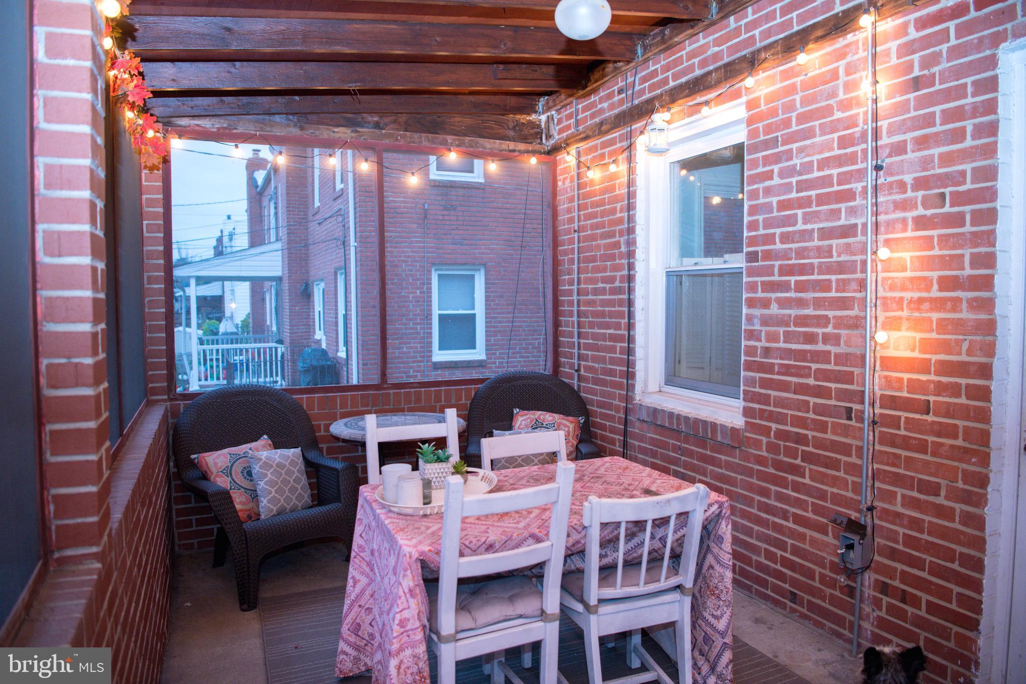 8637 Oak Road Baltimore, MD 21234 - Photo 8 of 18 a balcony view with a seating space