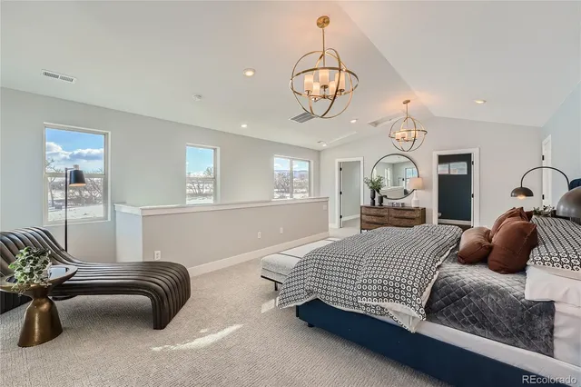 a bedroom with bed and window