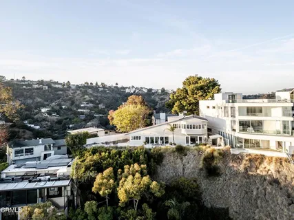 a large building with a view of a city