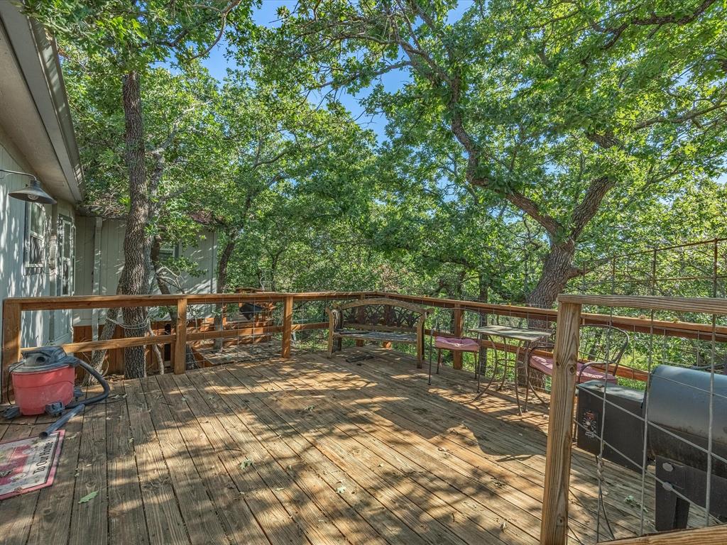 3275 Finis Road Graham, TX 76450 - Photo 31 of 36 a view of a balcony with chairs