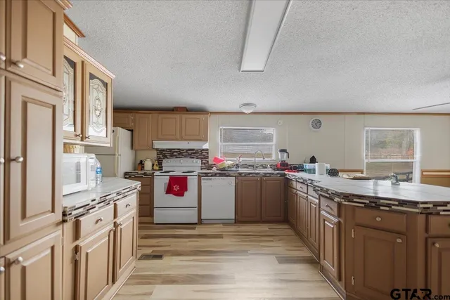 a bedroom with a bed and a table