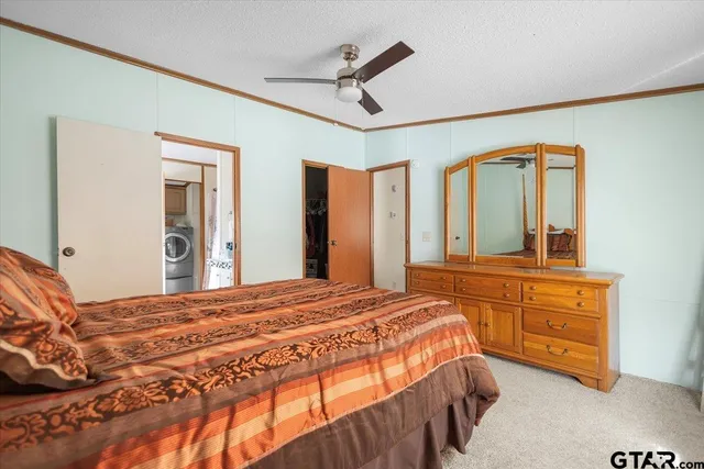 a bathroom with a sink double vanity and a mirror