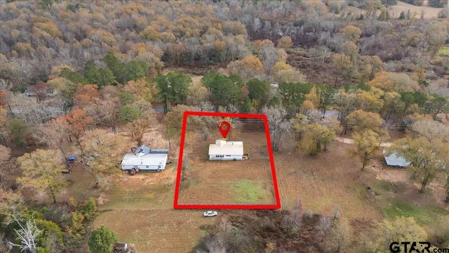 a room with wooden walls and bench