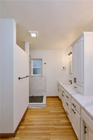 a bathroom with a toilet and a bathtub