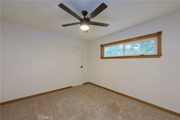 a kitchen with a sink a stove and a microwave