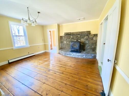 144 Halldale Road Montville, ME 04941 - Photo 9 of 32 Dining Room w: wood Stove