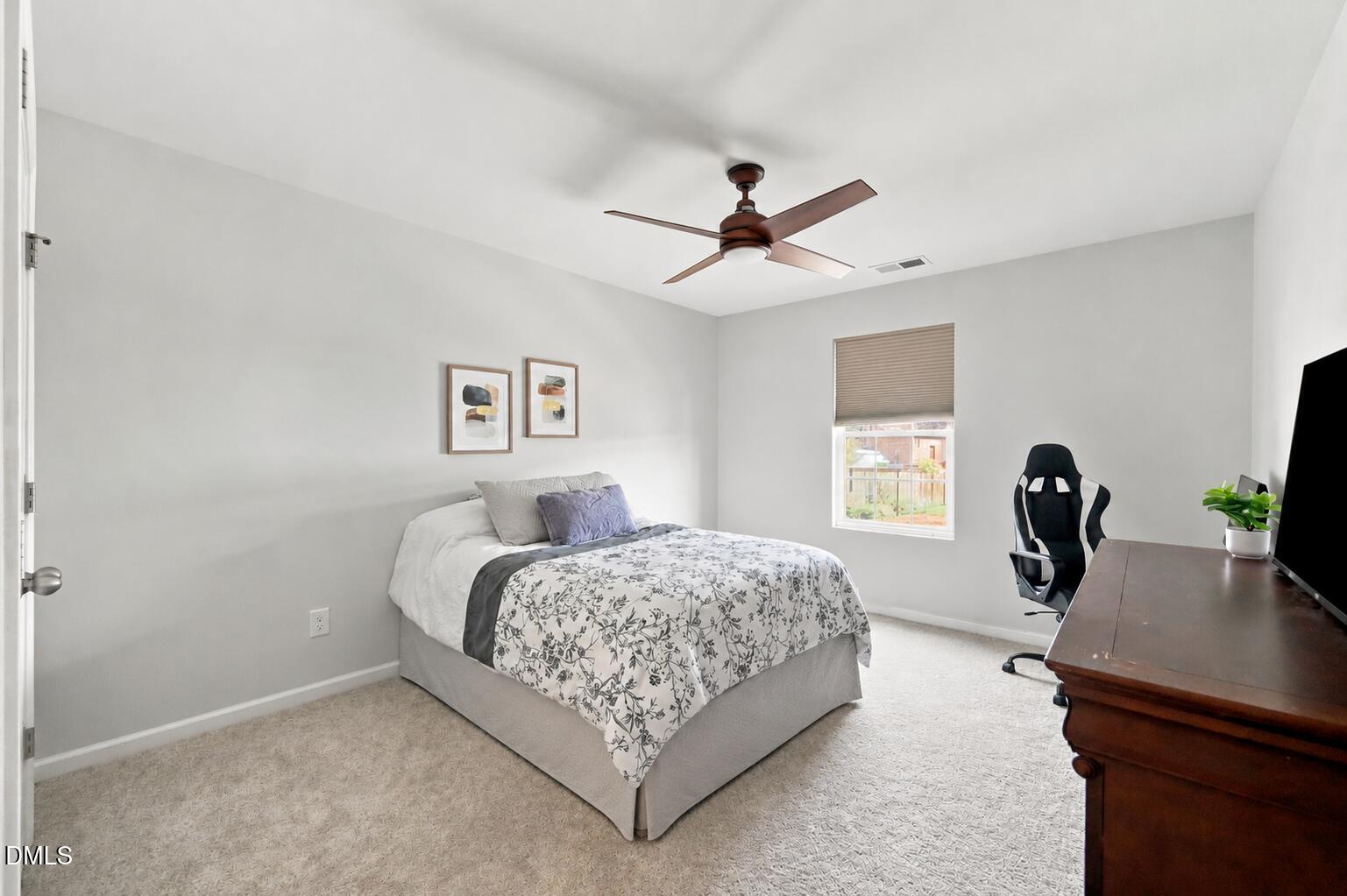 3434 Norway Spruce Road Raleigh, NC 27616 - Photo 32 of 34 Bedroom with bedskirt