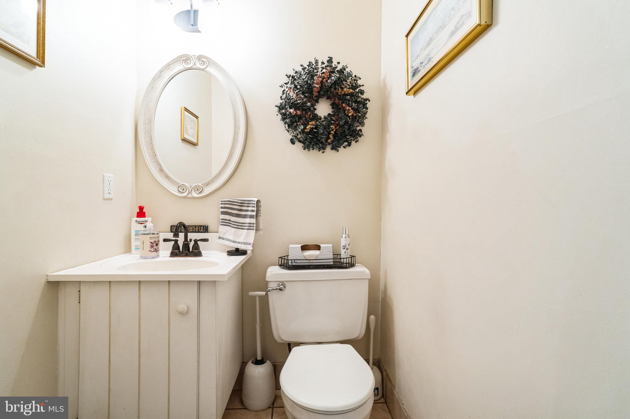 806 Kings Croft Drive Cherry Hill, NJ 08034 - Photo 14 of 31 a bathroom with a sink a toilet and a mirror