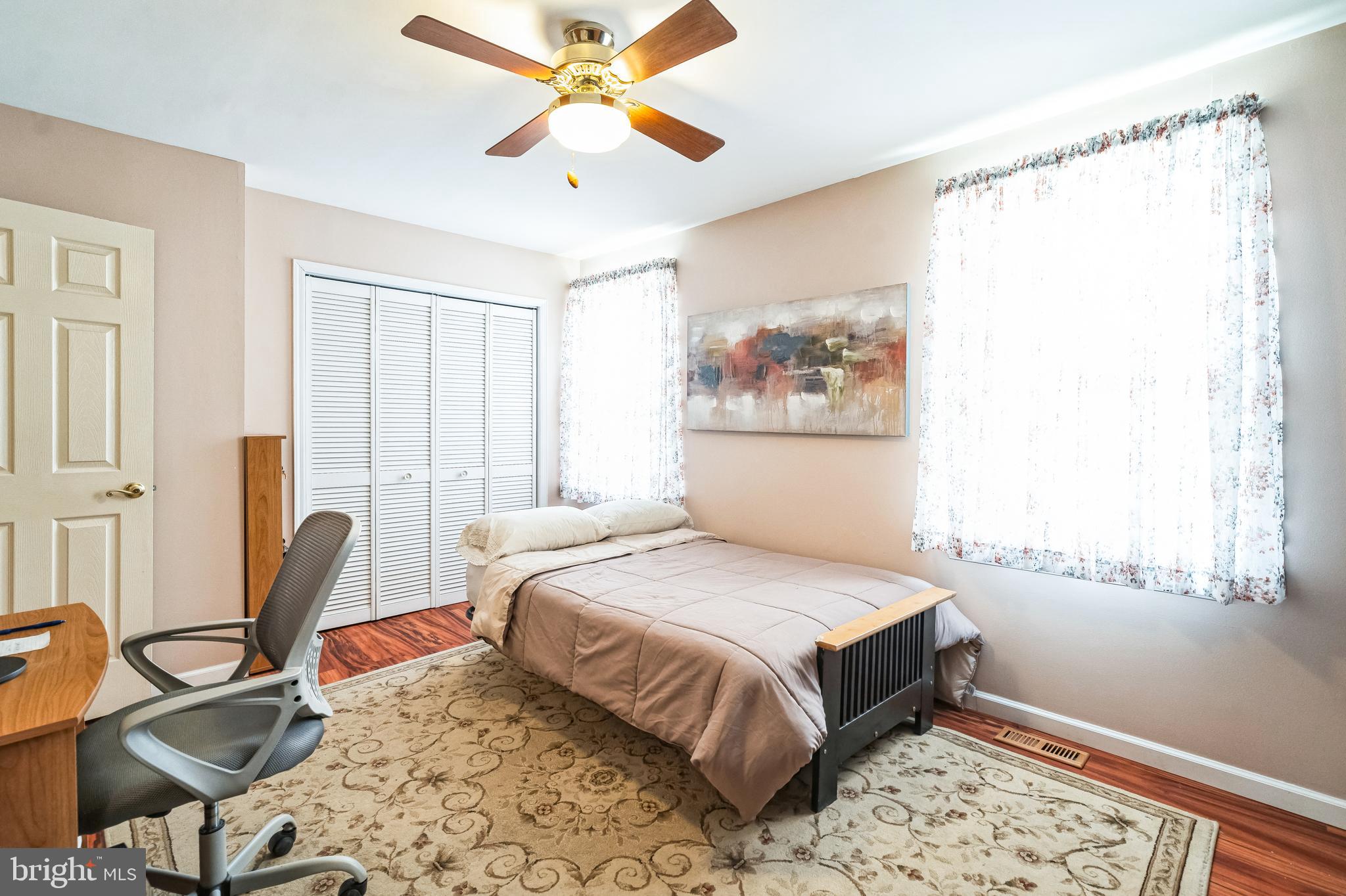 806 Kings Croft Drive Cherry Hill, NJ 08034 - Photo 17 of 31 a bedroom with a bed flat screen tv and a window