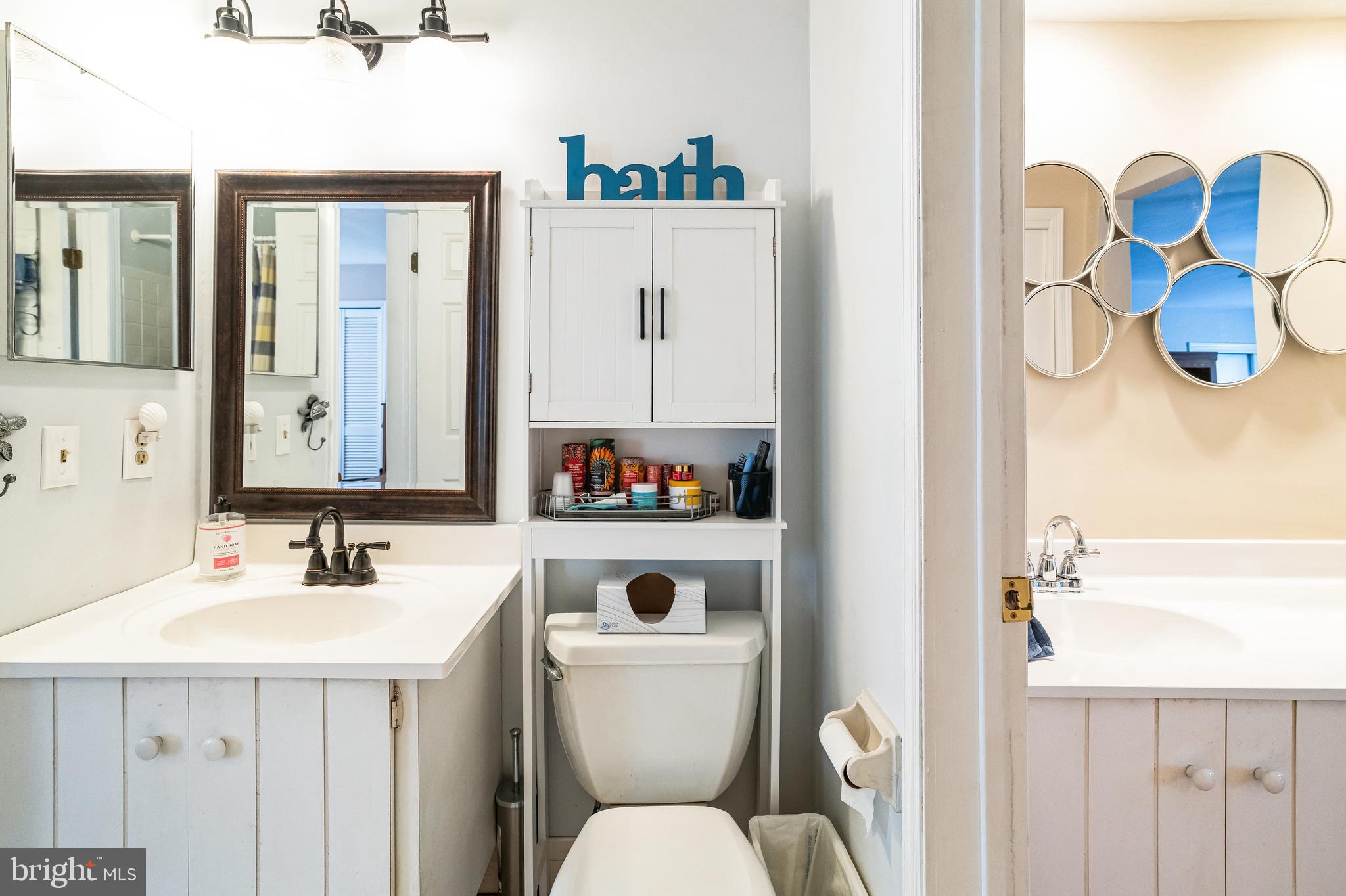 806 Kings Croft Drive Cherry Hill, NJ 08034 - Photo 18 of 31 a bathroom with a sink mirror and toilet