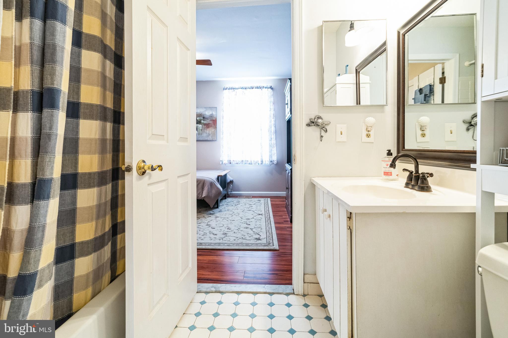 806 Kings Croft Drive Cherry Hill, NJ 08034 - Photo 19 of 31 a bathroom with a sink a toilet and shower