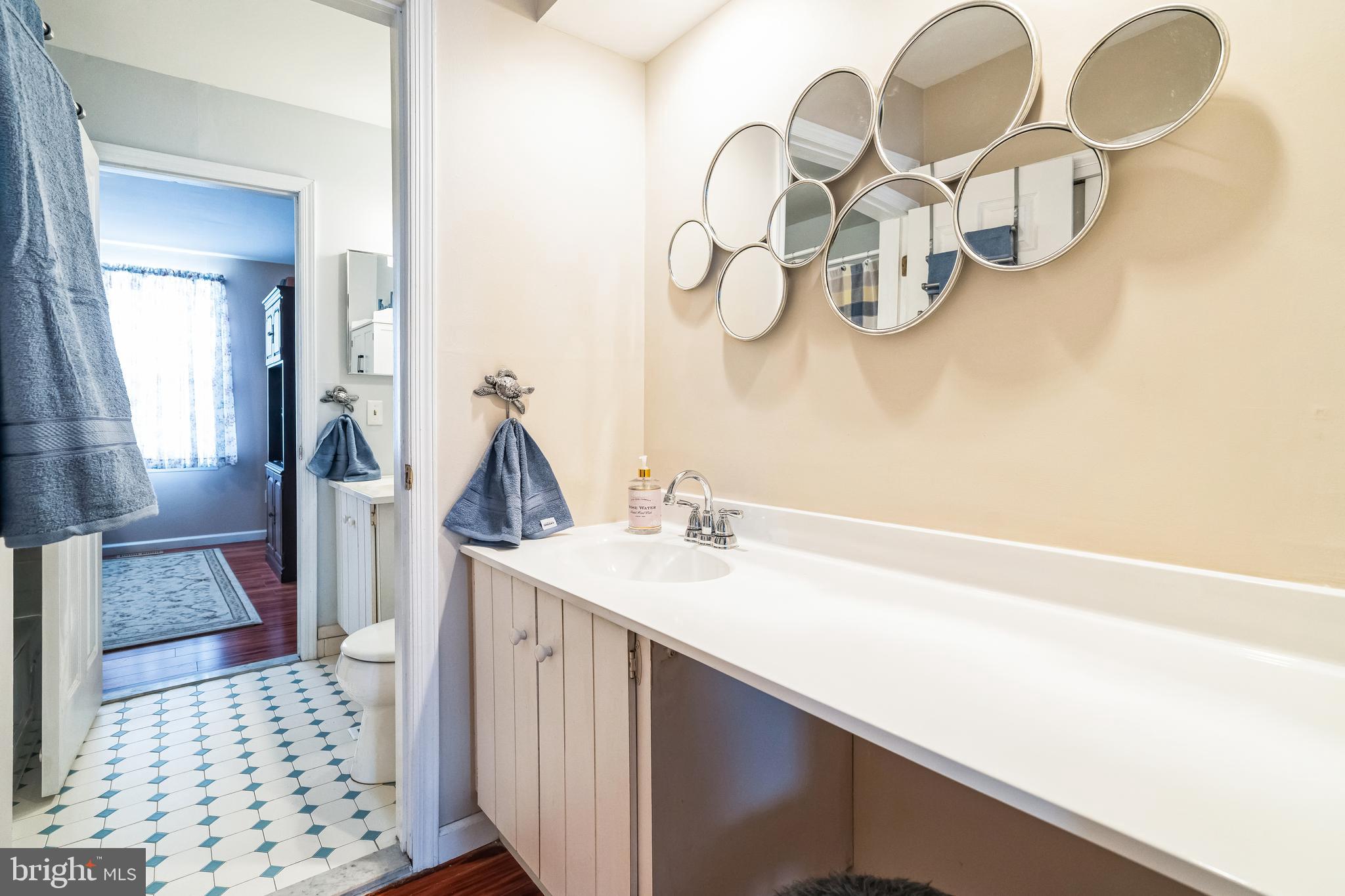 806 Kings Croft Drive Cherry Hill, NJ 08034 - Photo 20 of 31 a bathroom with a sink and a mirror