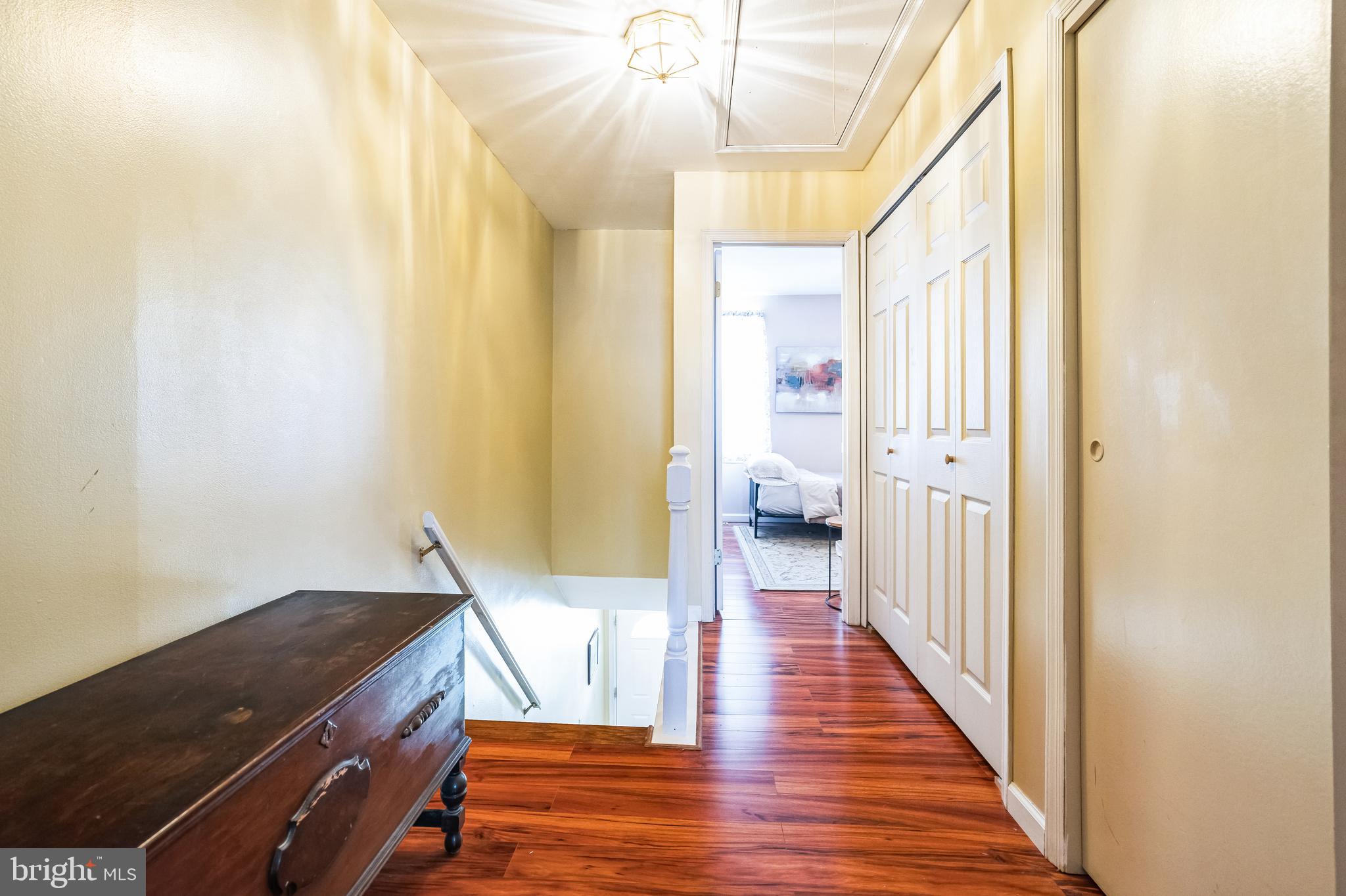 806 Kings Croft Drive Cherry Hill, NJ 08034 - Photo 25 of 31 a view of a hallway with wooden floor and staircase