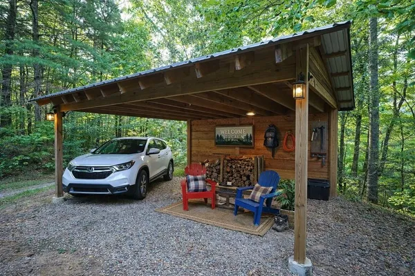 a view of a car parked in the yard