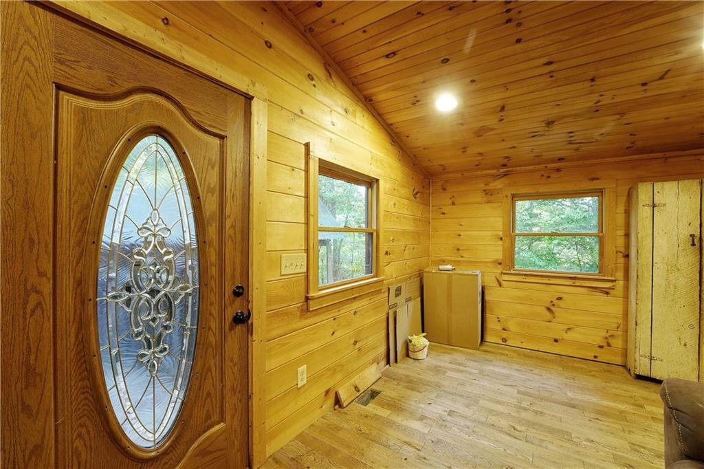 192 Bushy Head Road Cherry Log, GA 30522 - Photo 2 of 13 a view of a bathroom with a window and a mirror